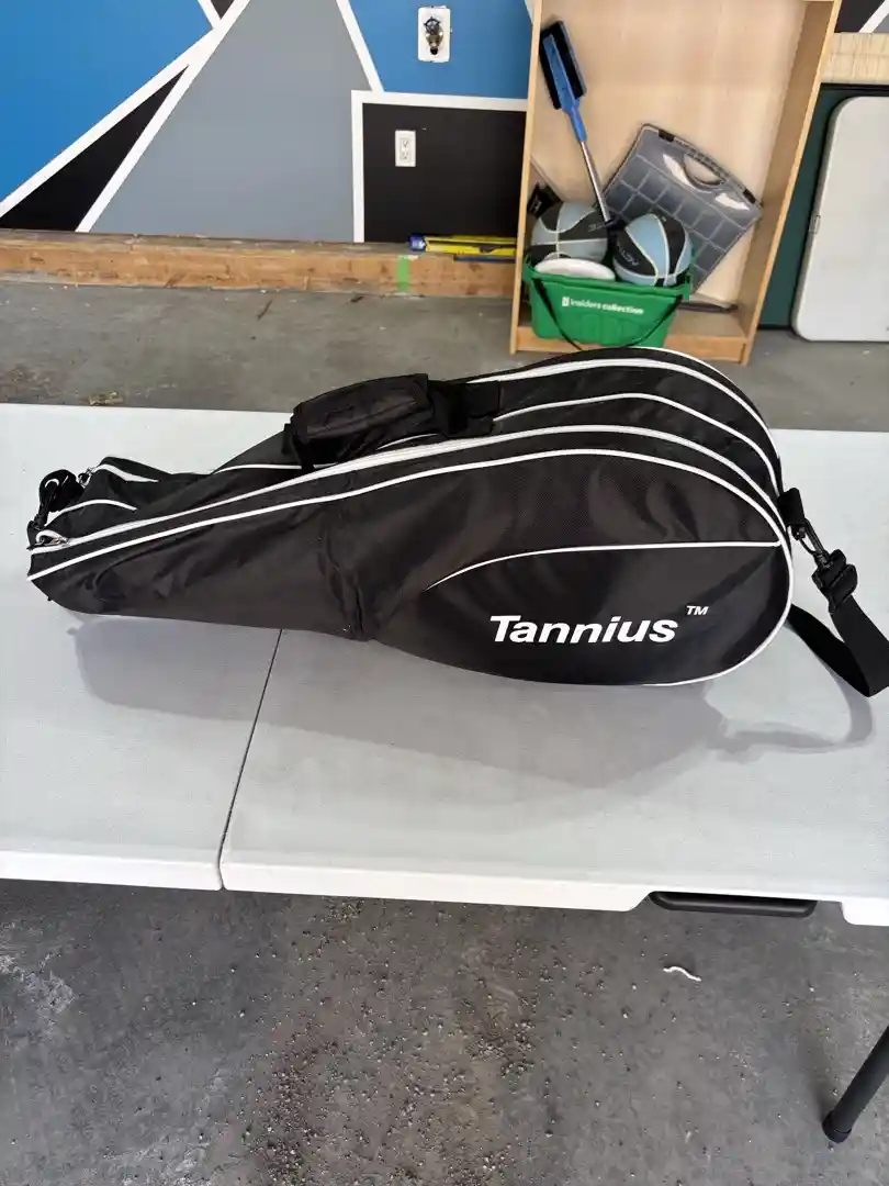 Tennis Racquets, Balls, and Bag